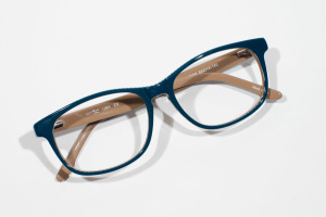 Tan and navy glasses with striped accents.