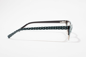 Profile, temple, or side view of polka dot pattern glasses.
