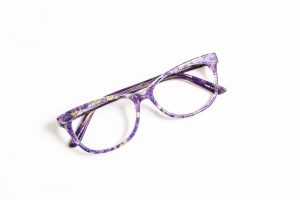 Purple pattern floral glasses in modern cat eye shape.